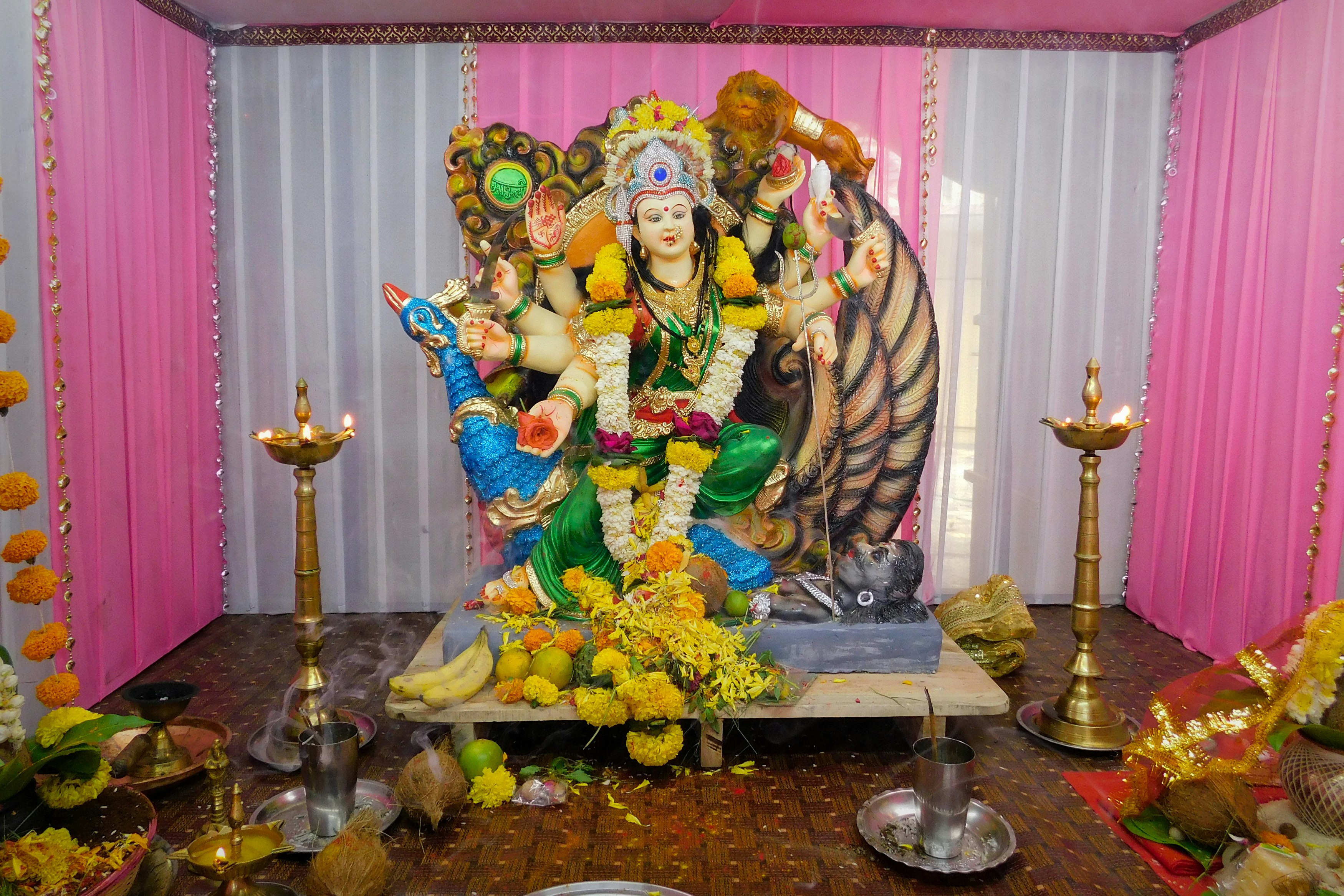 hindu deity figurine on table